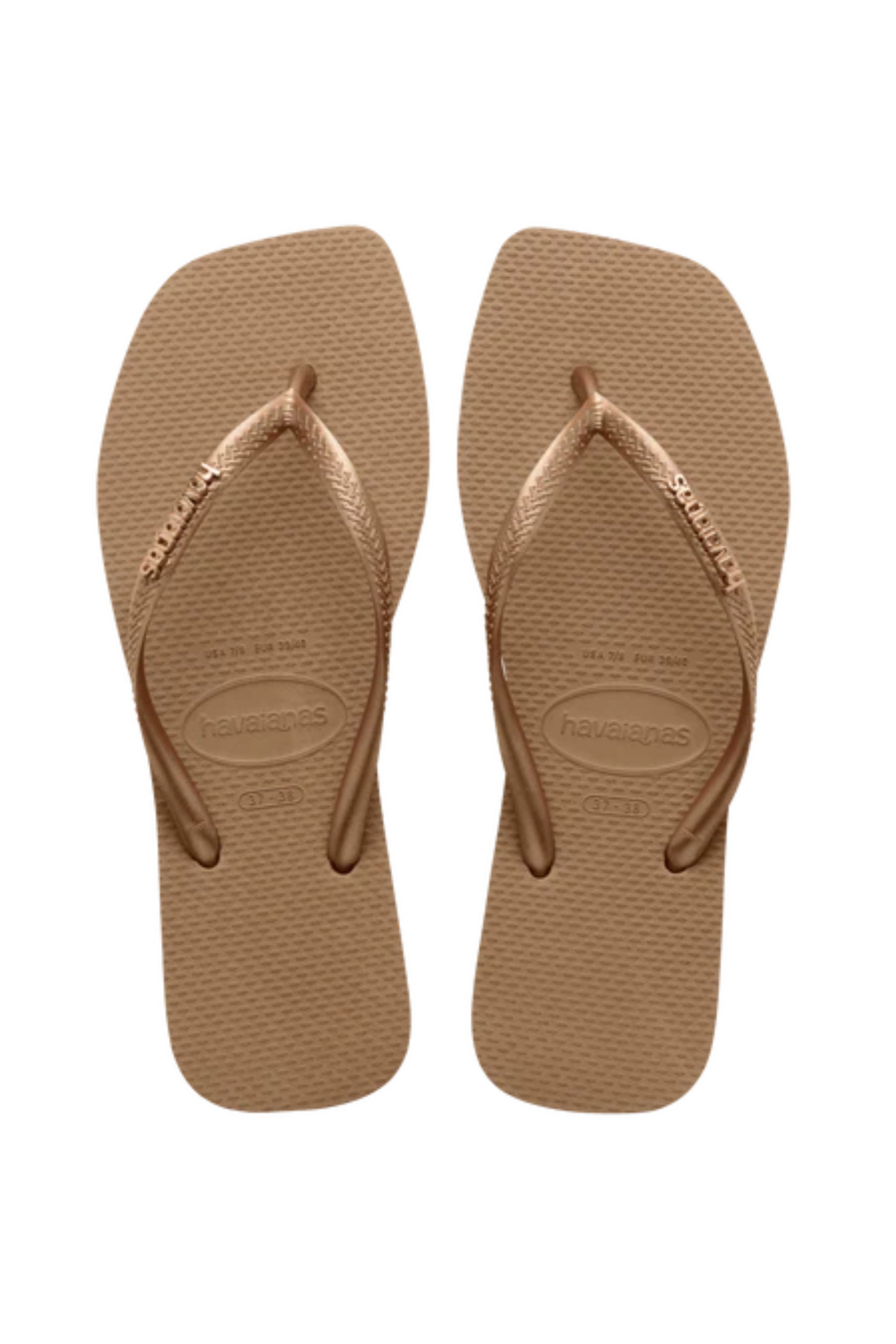 Rose gold Havaianas klipklapper med struktureret sål og metallic remme.