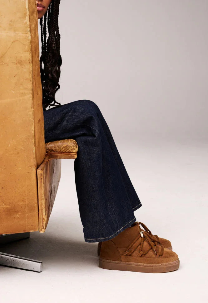 INUIKII bamsestøvler i beige lammeskind – vandtætte, luksuriøse vinterstøvler fra Number Nine.