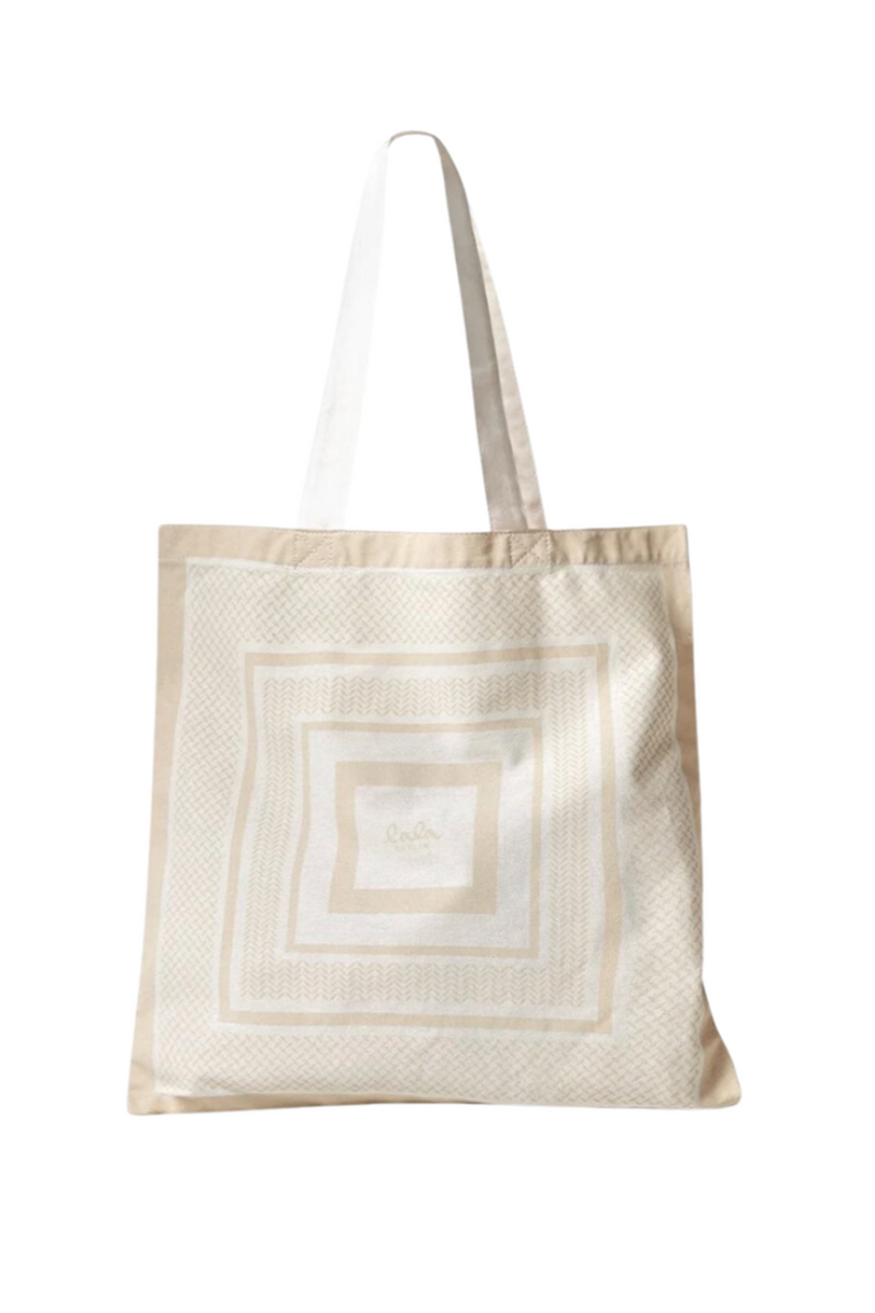 LALA BERLIN tote med creme striber, logo i midten. Farverne er creme og beige. Matchende håndtag.