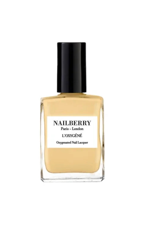 Neglelakflaske fra Nailberry i lys gul med sort låg, mærket "NAILBERRY" og "Oxygenated Nail Lacquer".