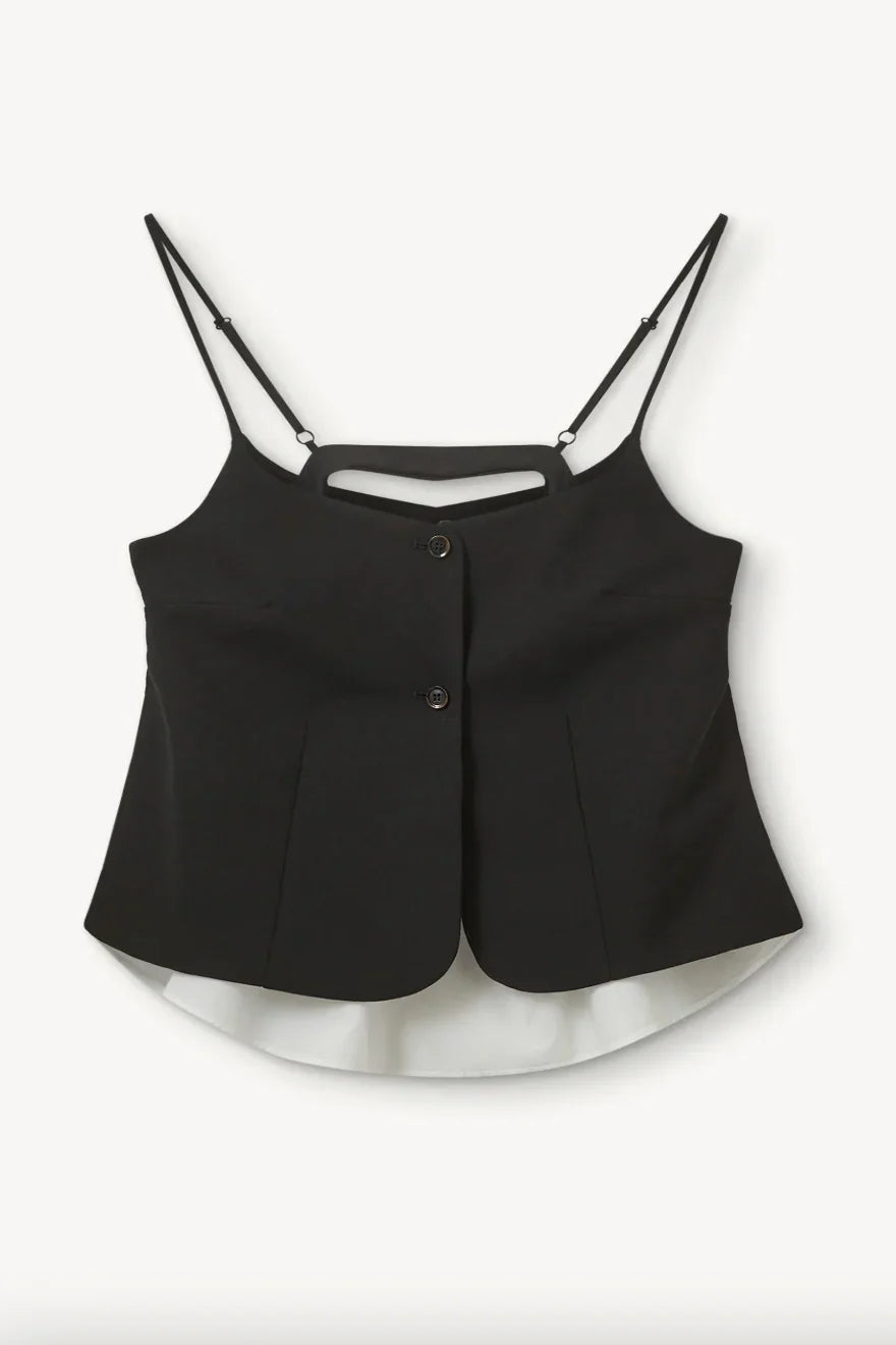 Sort top med justerbare stropper, knapper foran og hvid flydende bund bagpå.