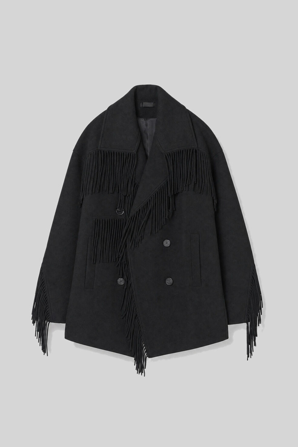 Sort oversized IRO Paris Drifter uldjakke med frynser langs krave, front og ærmer, bred reverskrave og dobbeltradet knaplukning.