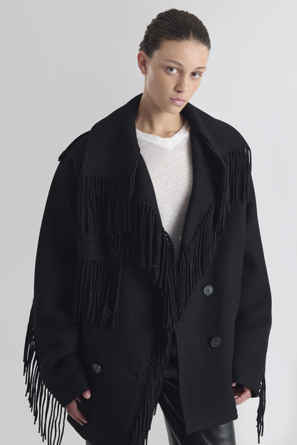 Sort oversized IRO Paris Drifter uldjakke med frynser langs krave, front og ærmer, bred reverskrave og dobbeltradet knaplukning.
