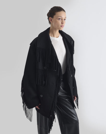 Sort oversized IRO Paris Drifter uldjakke med frynser langs krave, front og ærmer, bred reverskrave og dobbeltradet knaplukning fra siden