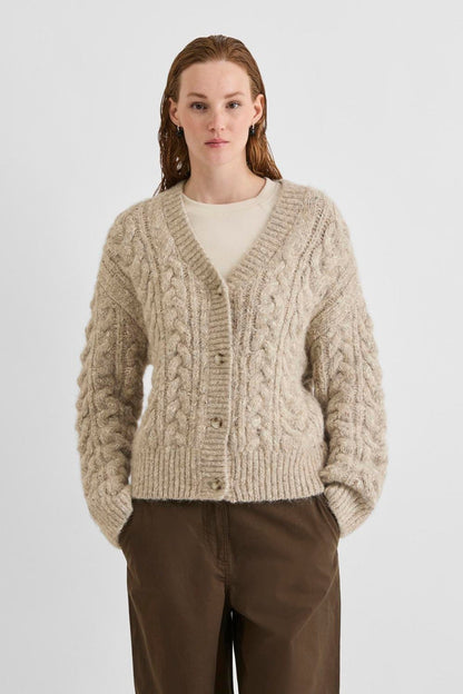 Vila ROUELLIS L/S Knit Cardigan in Pelican color, featuring a cable knit design, V-neck, and button closure, worn by a model.